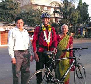 The victorious protagonist with his mother and brother